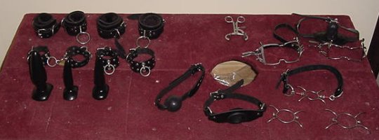Assorted gags, shackles, and butt plugs...